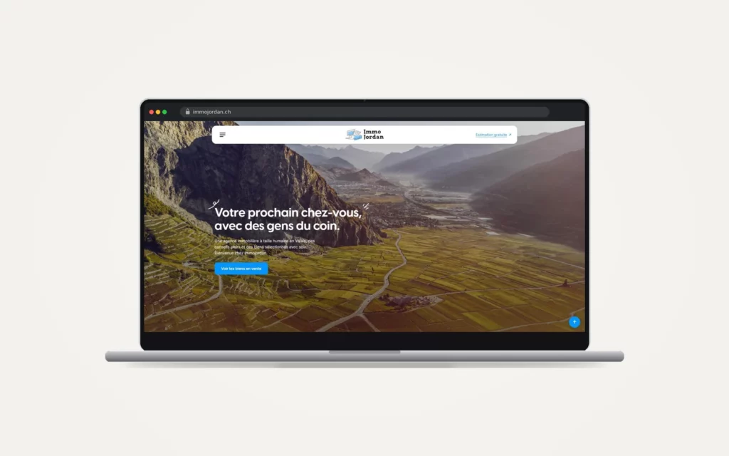 Site web ImmoJordan réalisé par le HUB Gencie, affiché sur un ordinateur portable